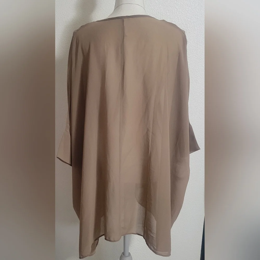 Free People embroidered oversized with tassel details boho style top size small